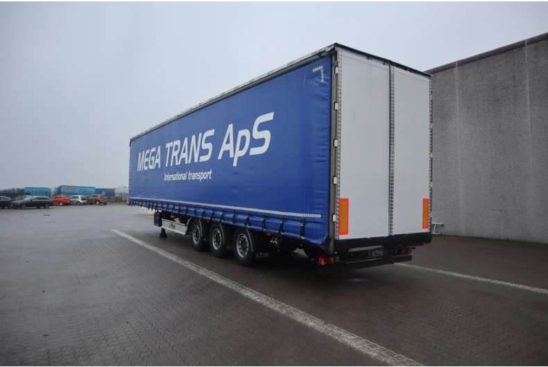 Fliegl Curtainsider / Planenauflieger / Gardin - Semi-trailer dengan terpal samping: gambar 4 Fliegl Curtainsider / Planenauflieger / Gardin - Semi-trailer dengan terpal samping: gambar 4