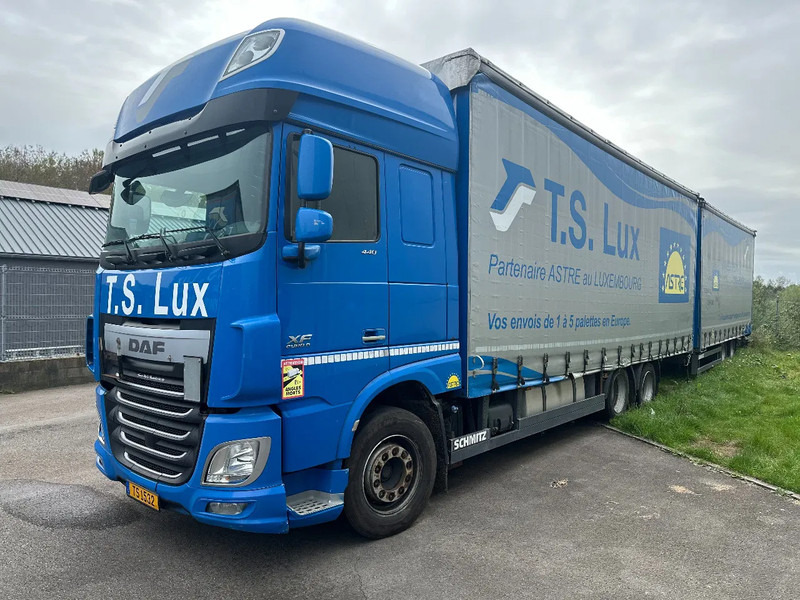 DAF XF 440 DAF XF 440 6x2 / SUPERSPACECAB / KOMBI MIT ANHANGER SCHMITZ 2016 / DURCHLADEN / 2 STUCK - Truk dengan terpal samping: gambar 1 DAF XF 440 DAF XF 440 6x2 / SUPERSPACECAB / KOMBI MIT ANHANGER SCHMITZ 2016 / DURCHLADEN / 2 STUCK - Truk dengan terpal samping: gambar 1