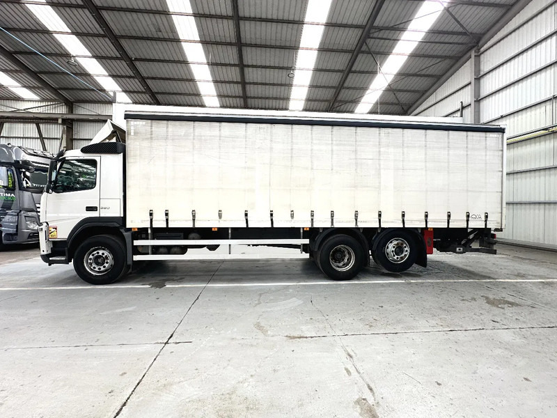 Volvo FM 330 / Essieu relevable et directionnel / Steerable lift axle / Lift as en stuuras - Truk dengan terpal samping: gambar 2 Volvo FM 330 / Essieu relevable et directionnel / Steerable lift axle / Lift as en stuuras - Truk dengan terpal samping: gambar 2