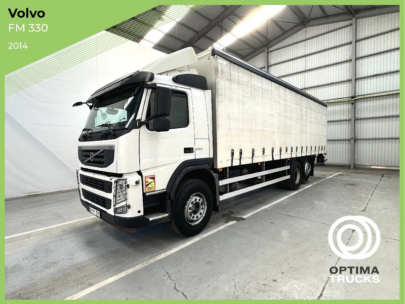 Volvo FM 330 / Essieu relevable et directionnel / Steerable lift axle / Lift as en stuuras - Truk dengan terpal samping: gambar 1 Volvo FM 330 / Essieu relevable et directionnel / Steerable lift axle / Lift as en stuuras - Truk dengan terpal samping: gambar 1