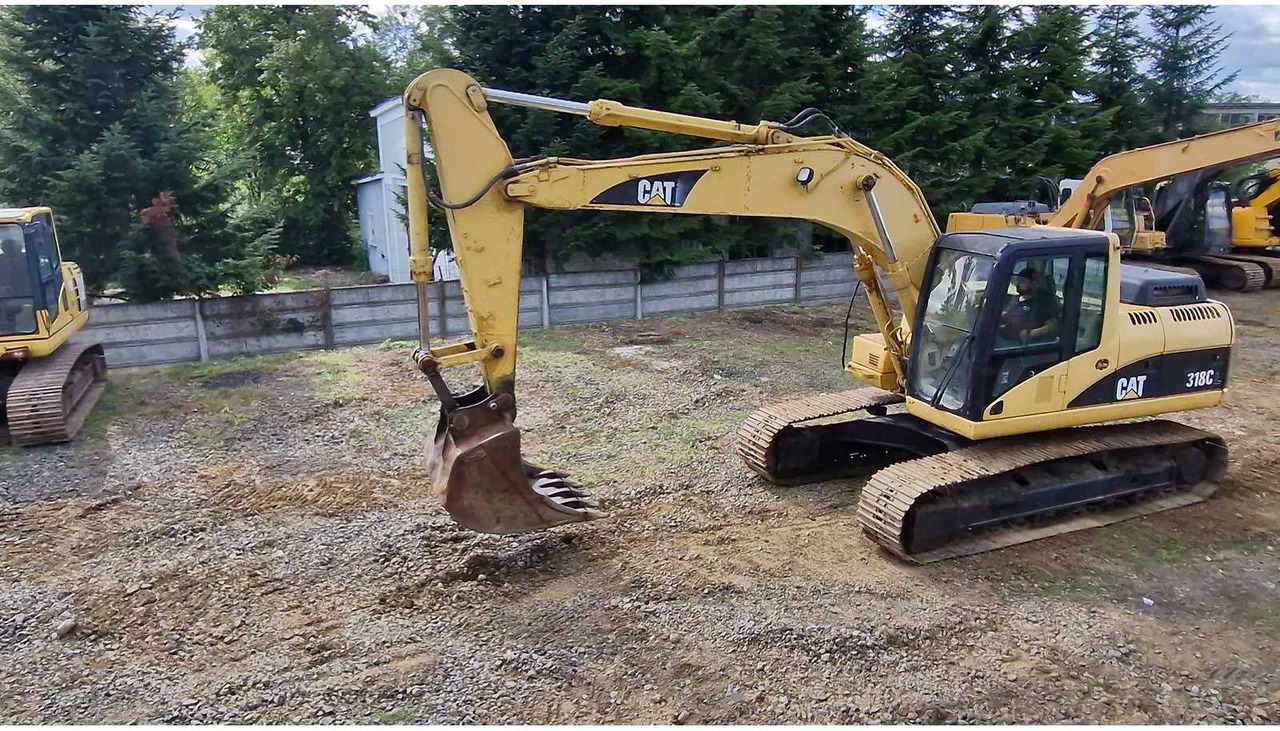 Caterpillar 318C - Ekskavator perayap: gambar 3 Caterpillar 318C - Ekskavator perayap: gambar 3