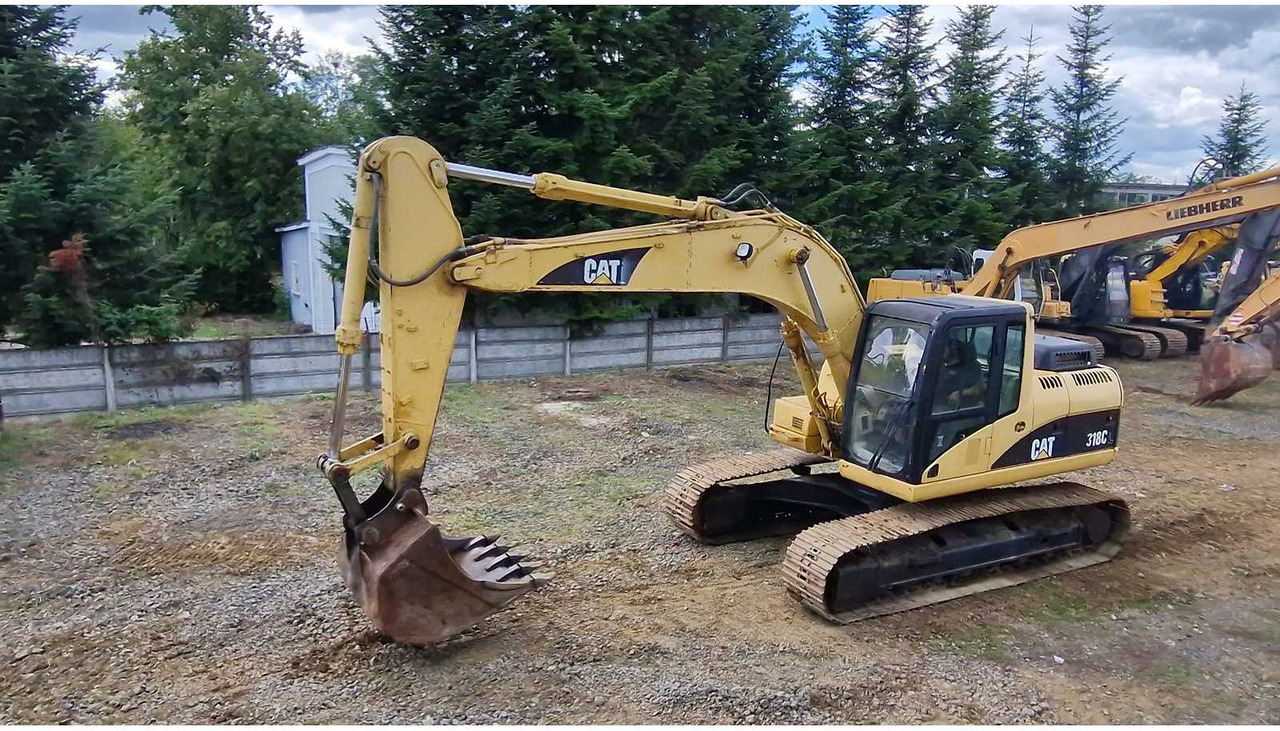 Caterpillar 318C - Ekskavator perayap: gambar 5 Caterpillar 318C - Ekskavator perayap: gambar 5