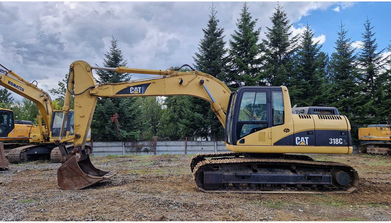 Caterpillar 318C - Ekskavator perayap: gambar 1 Caterpillar 318C - Ekskavator perayap: gambar 1