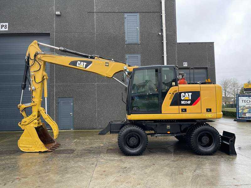 Caterpillar M314F - Ekskavator roda: gambar 1 Caterpillar M314F - Ekskavator roda: gambar 1