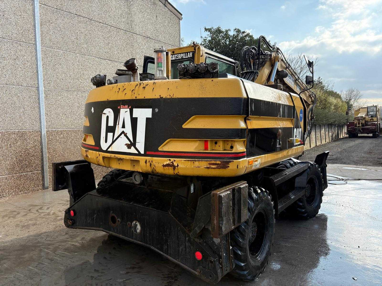 Caterpillar M315 - Ekskavator roda: gambar 3 Caterpillar M315 - Ekskavator roda: gambar 3