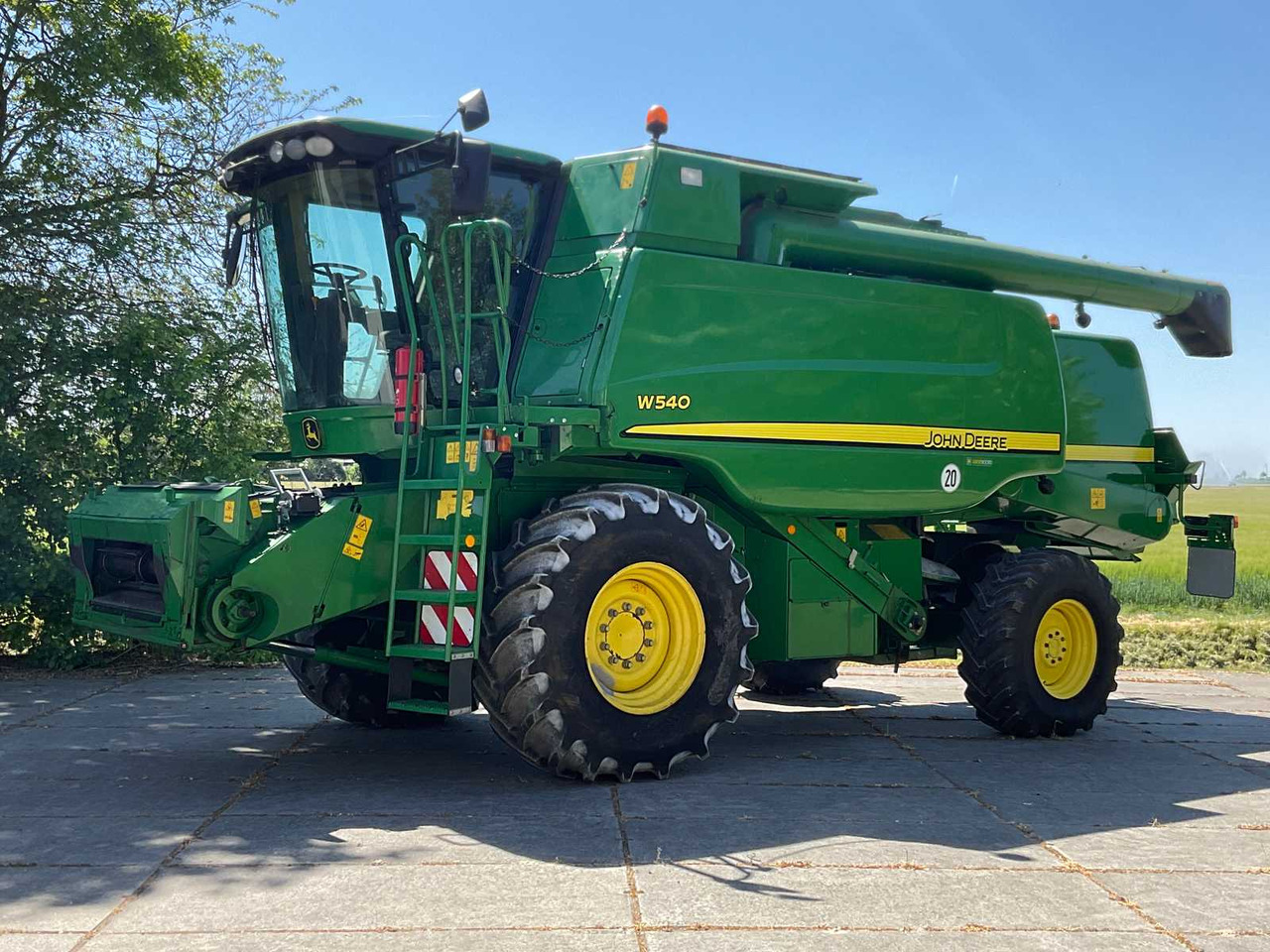 John Deere W540 - Pemanen gabungan: gambar 1 John Deere W540 - Pemanen gabungan: gambar 1