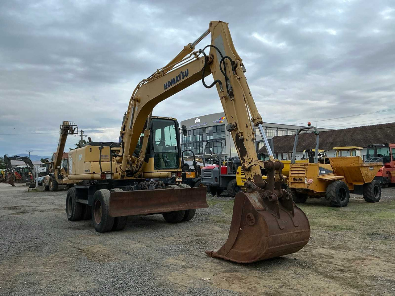 Komatsu PW 130 -7K - Ekskavator roda: gambar 1 Komatsu PW 130 -7K - Ekskavator roda: gambar 1