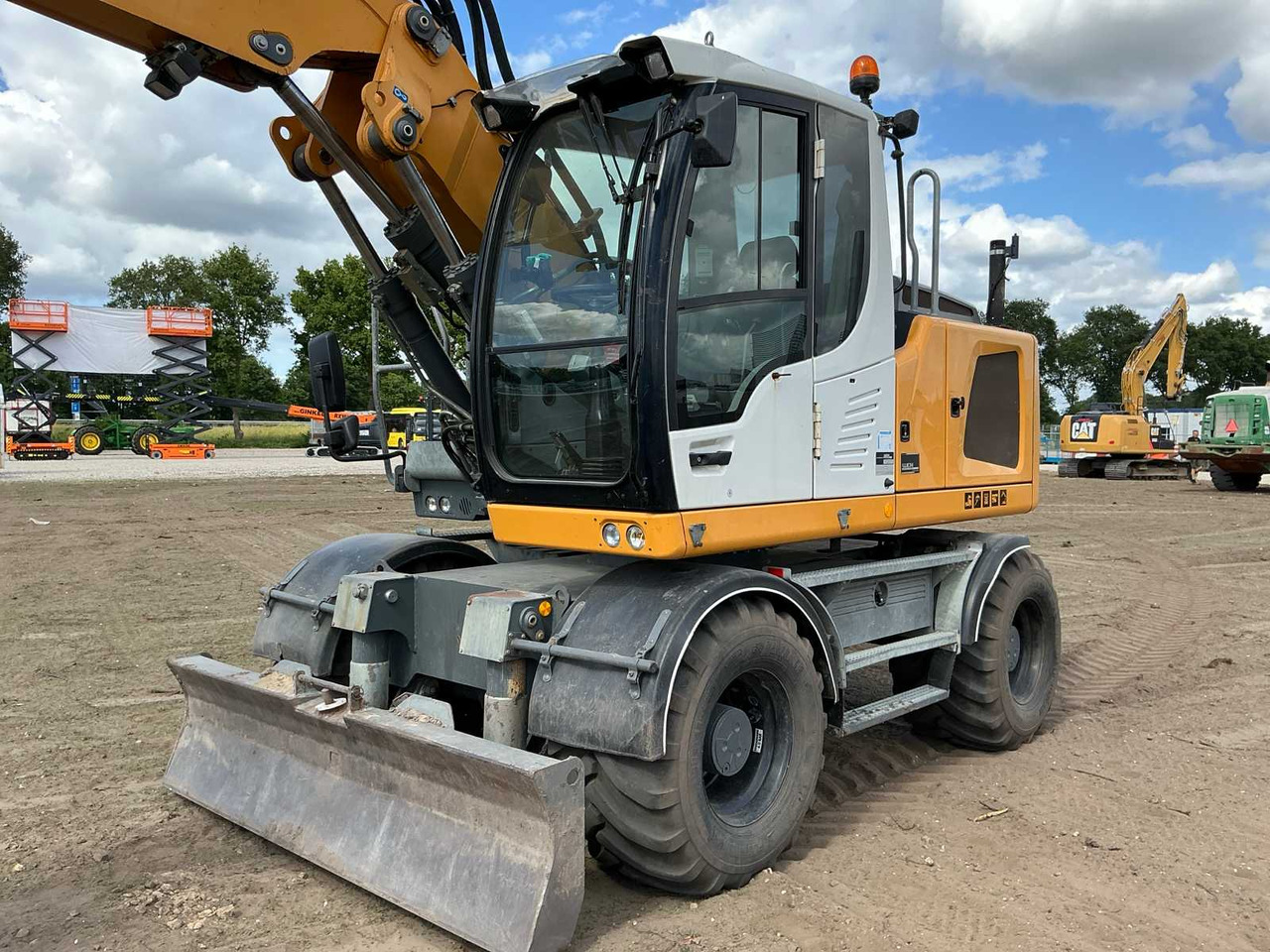 Liebherr A914 Litronic - Ekskavator roda: gambar 2 Liebherr A914 Litronic - Ekskavator roda: gambar 2