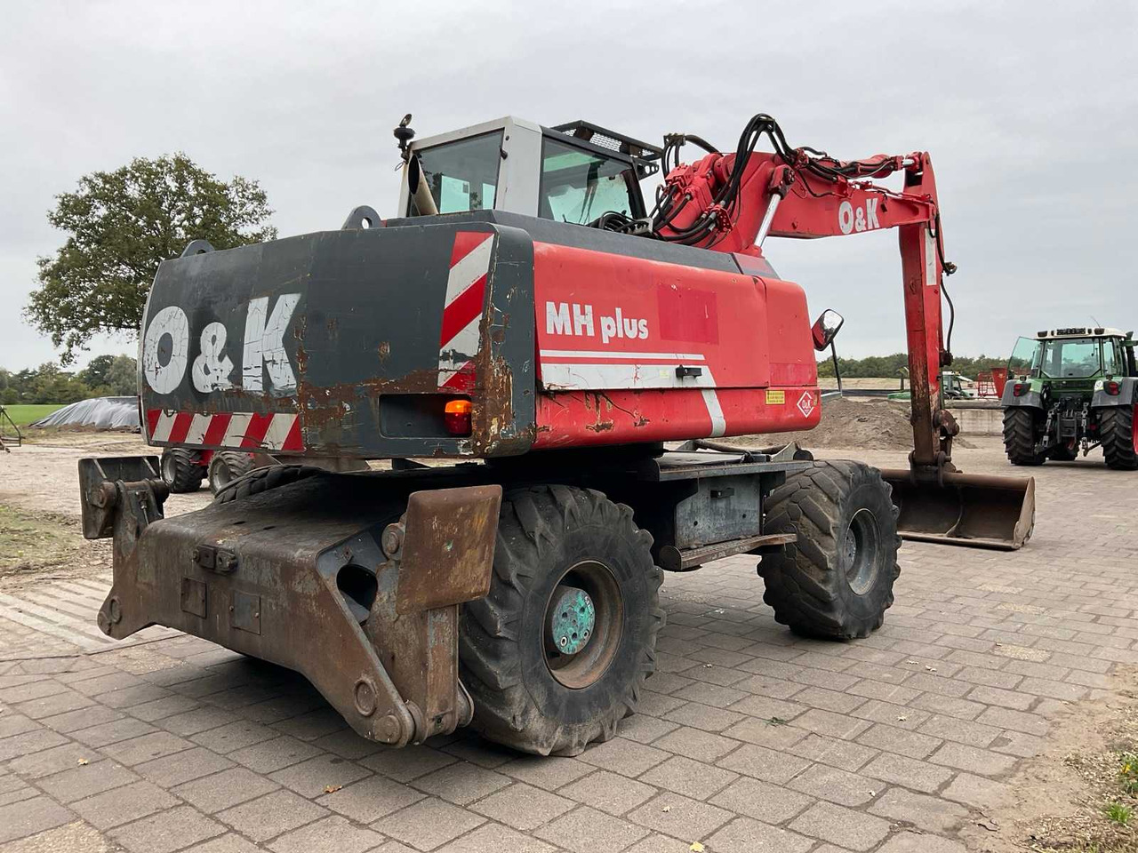 O&K MH Plus - Ekskavator roda: gambar 5 O&K MH Plus - Ekskavator roda: gambar 5