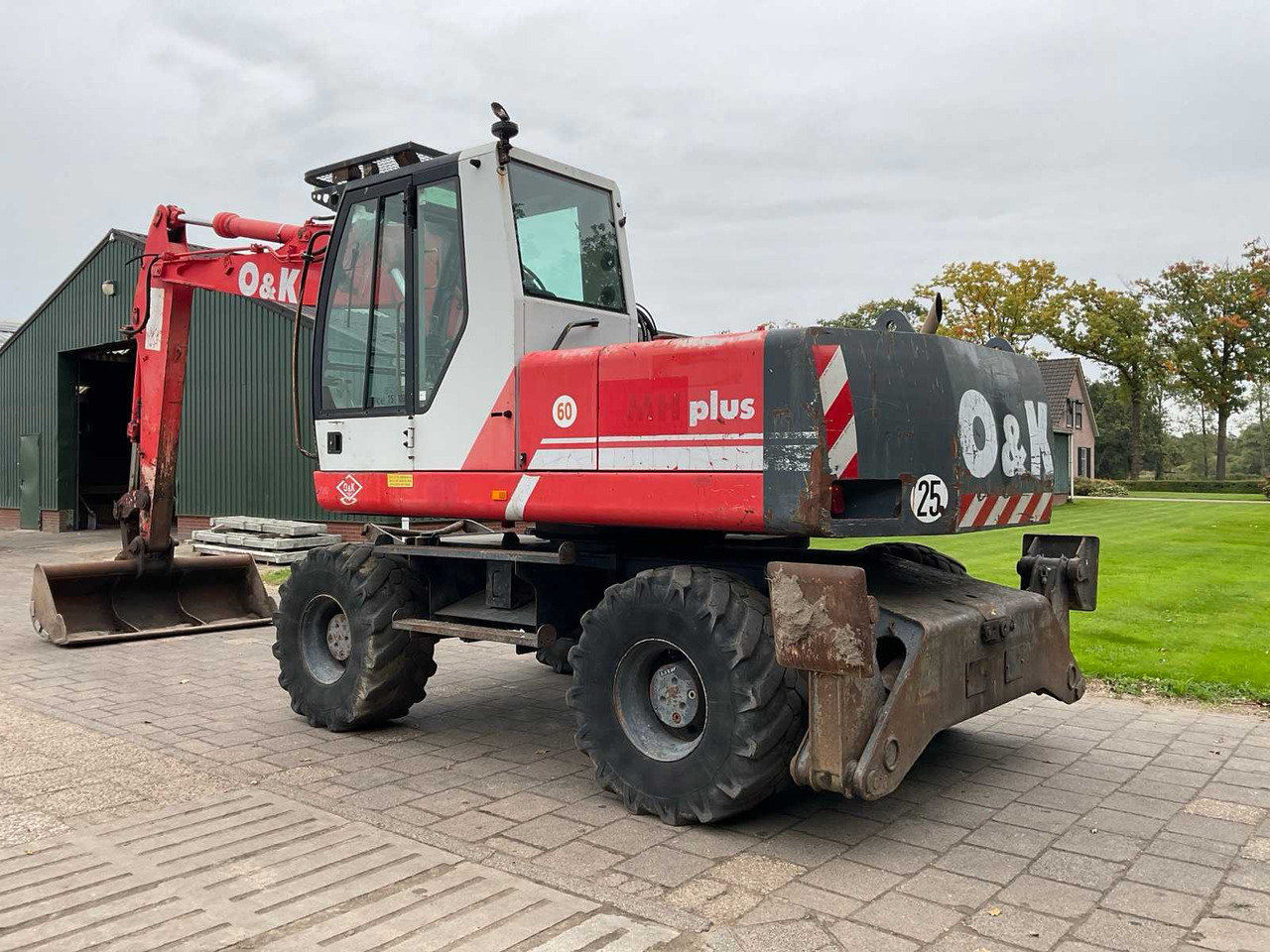 O&K MH Plus - Ekskavator roda: gambar 3 O&K MH Plus - Ekskavator roda: gambar 3