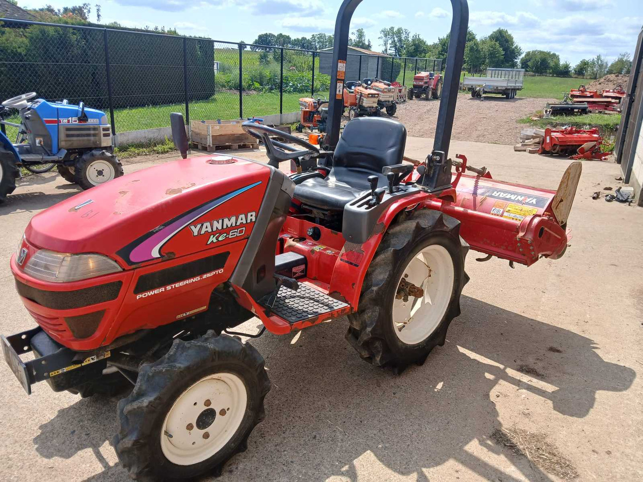 Yanmar Ke-60 - Traktor kompak: gambar 1 Yanmar Ke-60 - Traktor kompak: gambar 1