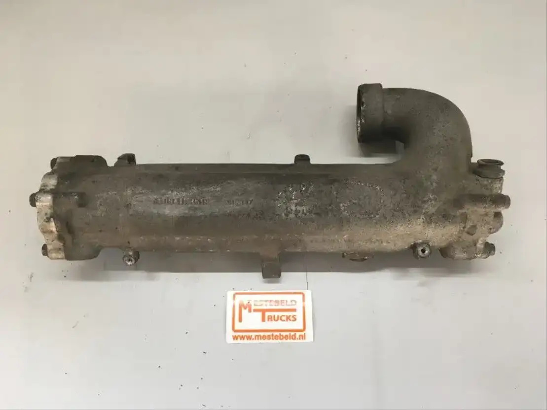 MAN Inlaatspruitstuk voor turbo - Suku Cadang Mesin untuk Truk: gambar 1 MAN Inlaatspruitstuk voor turbo - Suku Cadang Mesin untuk Truk: gambar 1
