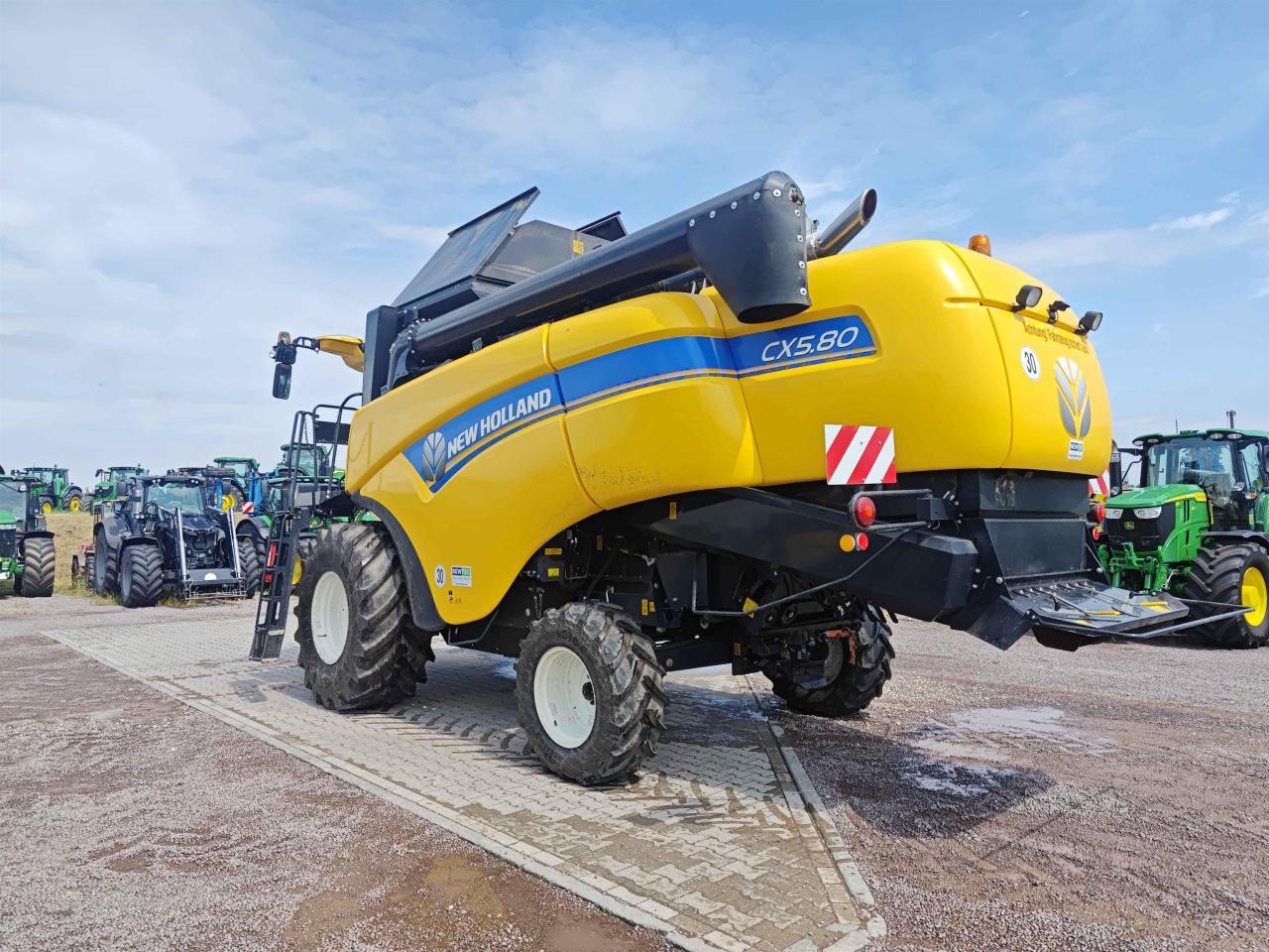 New Holland CX 5.80 - Pemanen gabungan: gambar 4 New Holland CX 5.80 - Pemanen gabungan: gambar 4