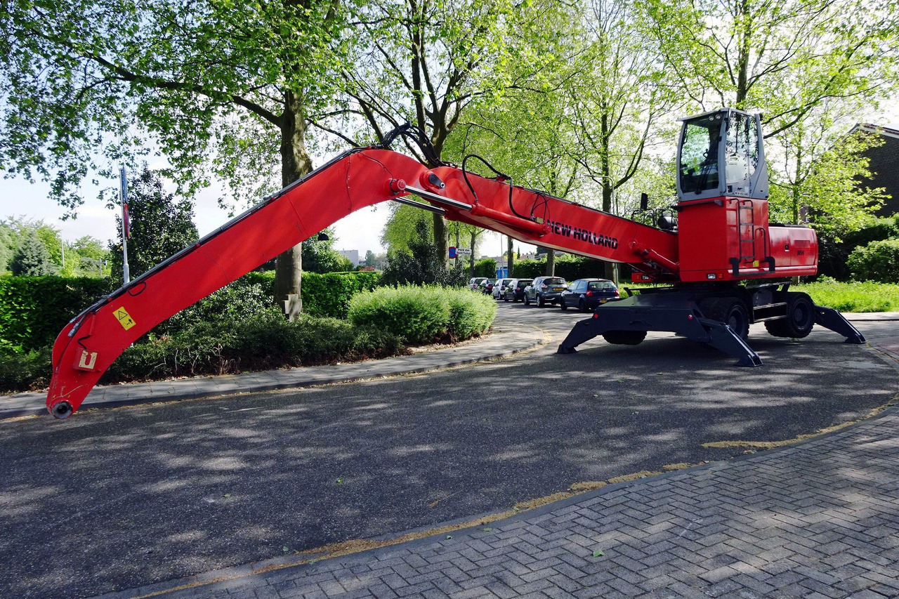 New Holland MH 6.6 Materialhandler With Magnet System - Mesin pengisi: gambar 2 New Holland MH 6.6 Materialhandler With Magnet System - Mesin pengisi: gambar 2