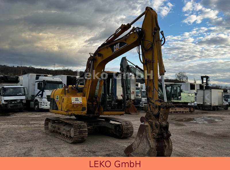 Caterpillar 311C Mit Zwei Löffeln - Ekskavator perayap: gambar 1 Caterpillar 311C Mit Zwei Löffeln - Ekskavator perayap: gambar 1