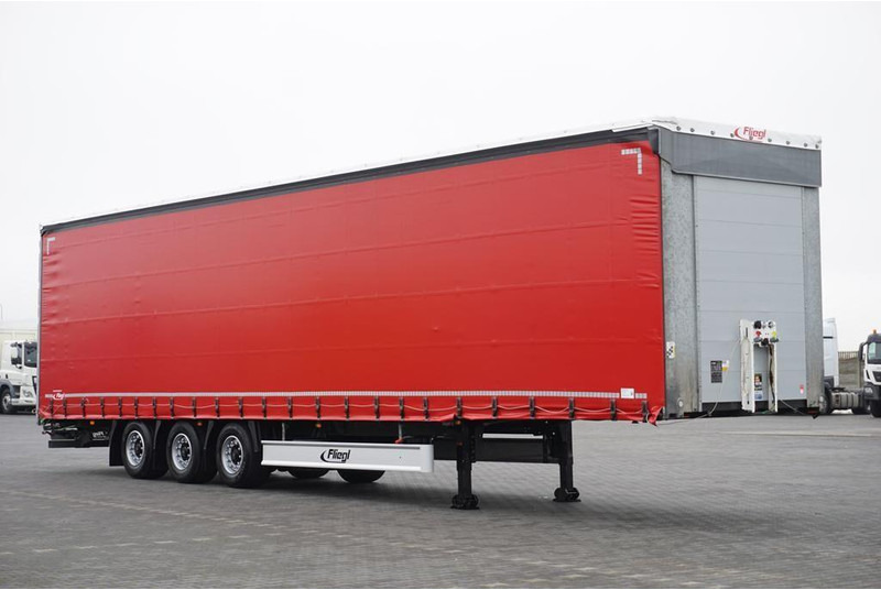 Fliegl FIRANKA / MEGA / MULTI LOCK / XL / OŚ PODNOSZONA - Semi-trailer dengan terpal samping: gambar 1 Fliegl FIRANKA / MEGA / MULTI LOCK / XL / OŚ PODNOSZONA - Semi-trailer dengan terpal samping: gambar 1