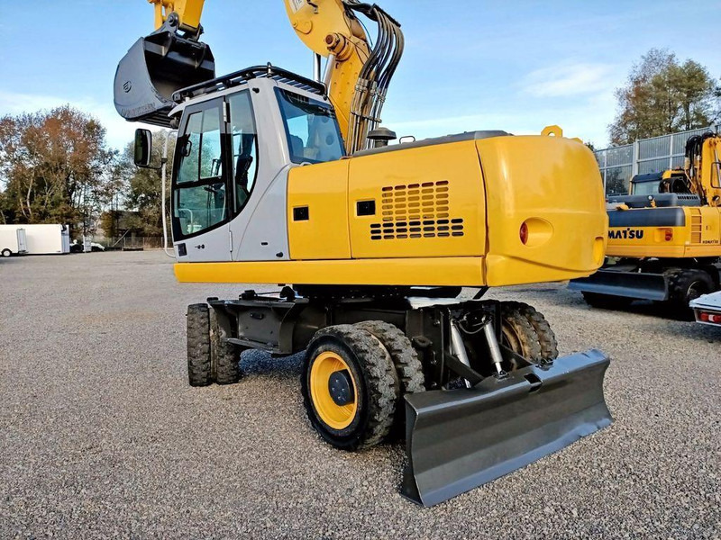 New Holland WE 190 - Ekskavator roda: gambar 3 New Holland WE 190 - Ekskavator roda: gambar 3