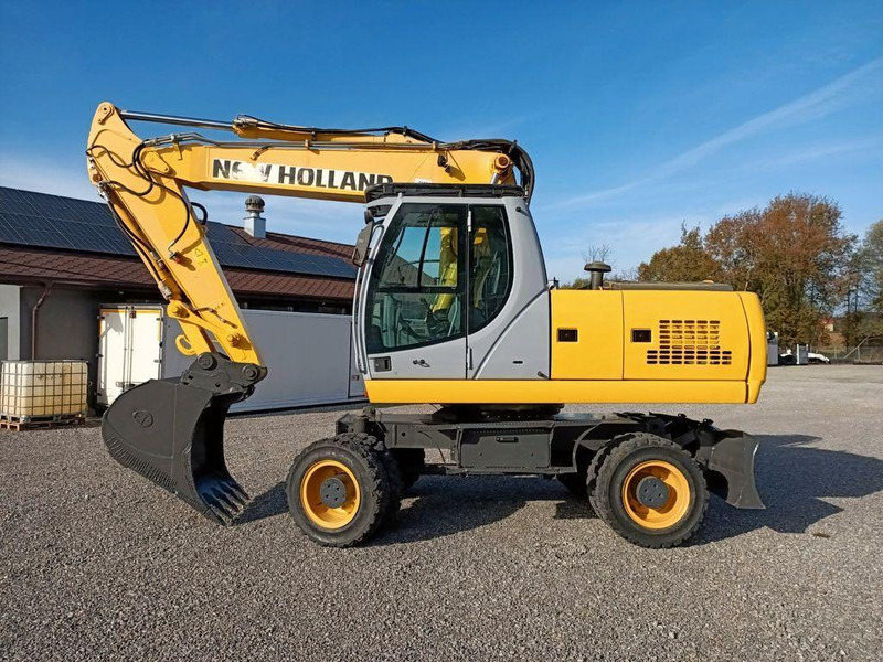 New Holland WE 190 - Ekskavator roda: gambar 2 New Holland WE 190 - Ekskavator roda: gambar 2