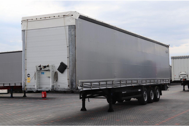 Schmitz Cargobull CURTAINSIDER / STANDARD / LIFTED AXLE / XL CODE / - Semi-trailer dengan terpal samping: gambar 1 Schmitz Cargobull CURTAINSIDER / STANDARD / LIFTED AXLE / XL CODE / - Semi-trailer dengan terpal samping: gambar 1