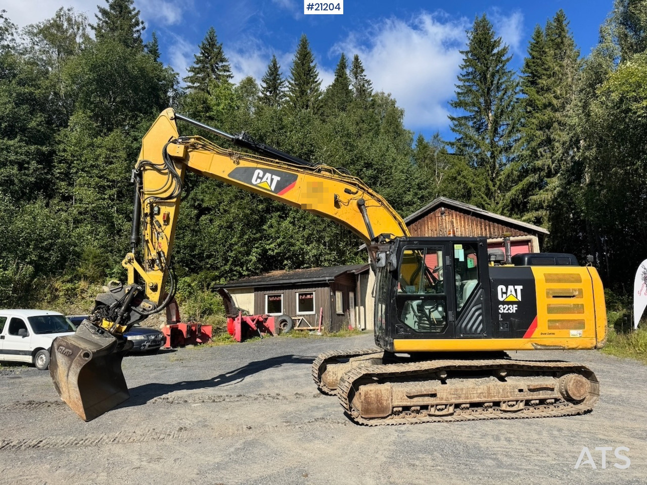 Caterpillar 323FL - Ekskavator perayap: gambar 3 Caterpillar 323FL - Ekskavator perayap: gambar 3