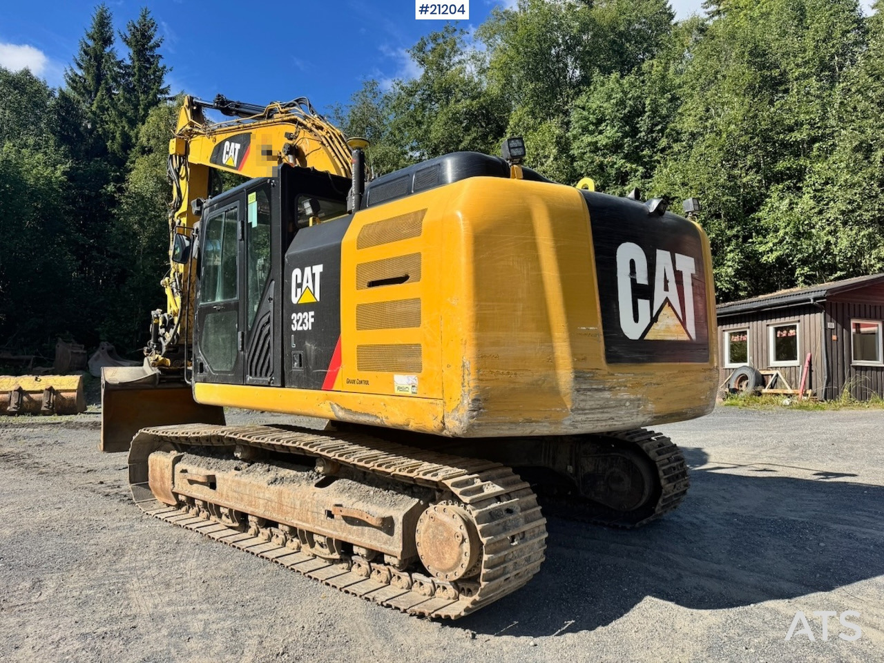 Caterpillar 323FL - Ekskavator perayap: gambar 5 Caterpillar 323FL - Ekskavator perayap: gambar 5