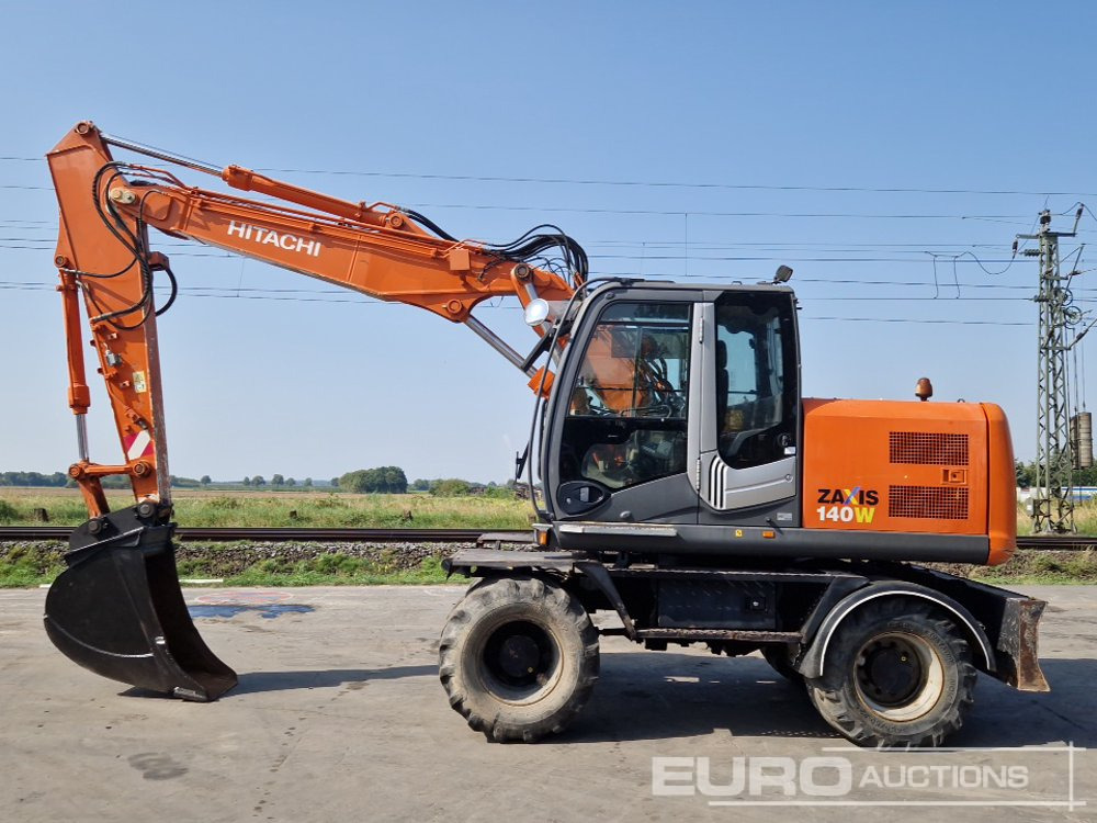 2009 Hitachi ZX140W-3 - Ekskavator roda: gambar 2 2009 Hitachi ZX140W-3 - Ekskavator roda: gambar 2