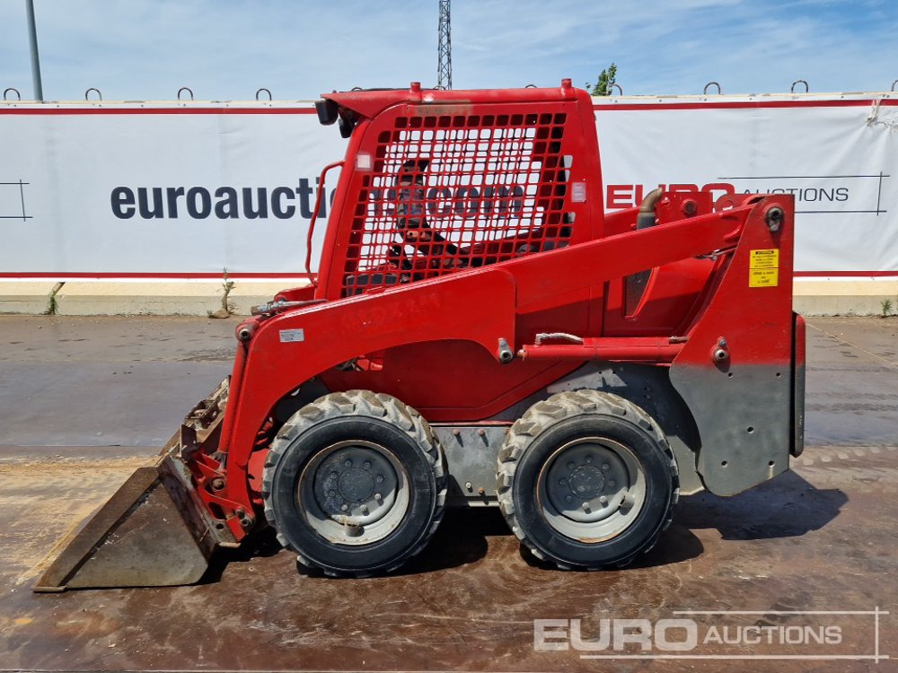 Komatsu SK-714 - Skid steer: gambar 2 Komatsu SK-714 - Skid steer: gambar 2