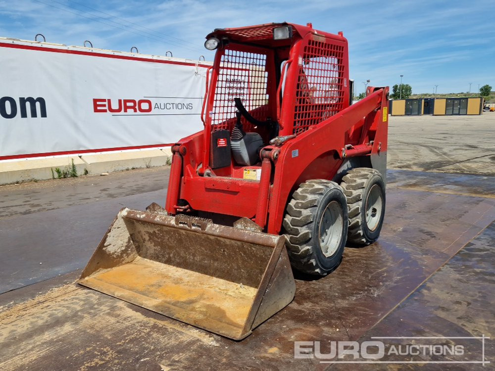 Komatsu SK-714 - Skid steer: gambar 1 Komatsu SK-714 - Skid steer: gambar 1