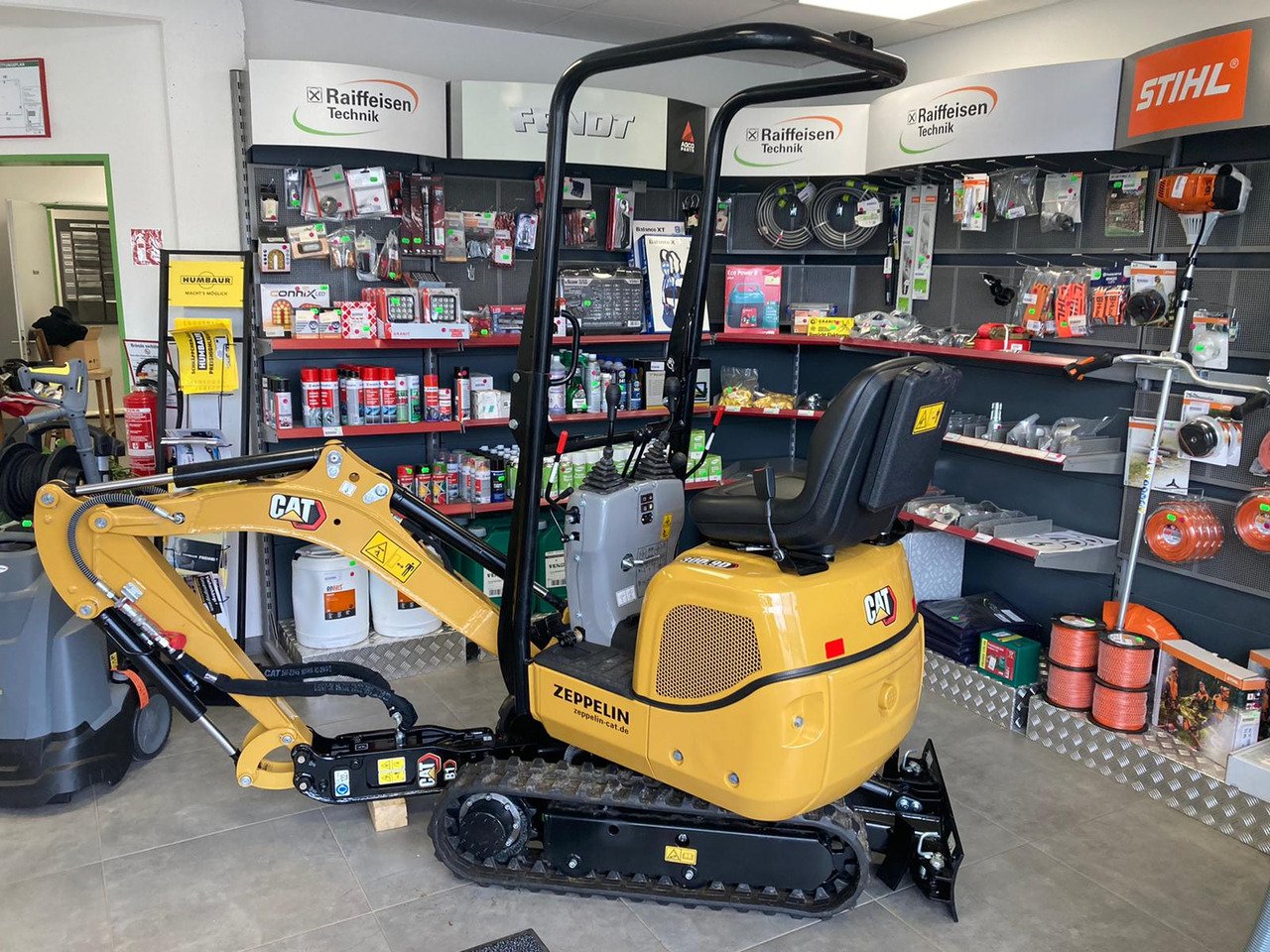 Caterpillar Mobilbagger 300.9D - Ekskavator: gambar 1 Caterpillar Mobilbagger 300.9D - Ekskavator: gambar 1