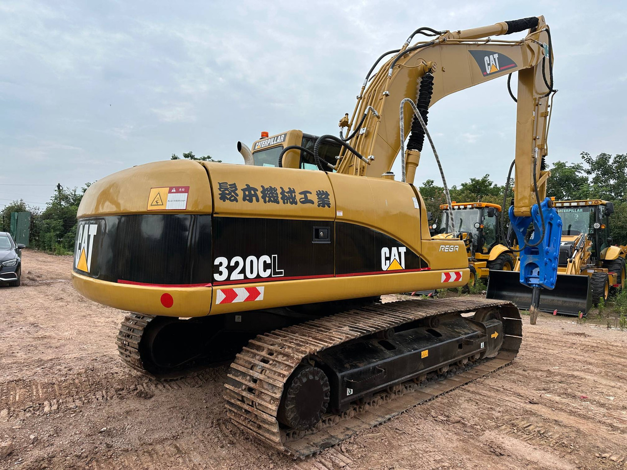 CATERPILLAR 320CL - Ekskavator perayap: gambar 2 CATERPILLAR 320CL - Ekskavator perayap: gambar 2