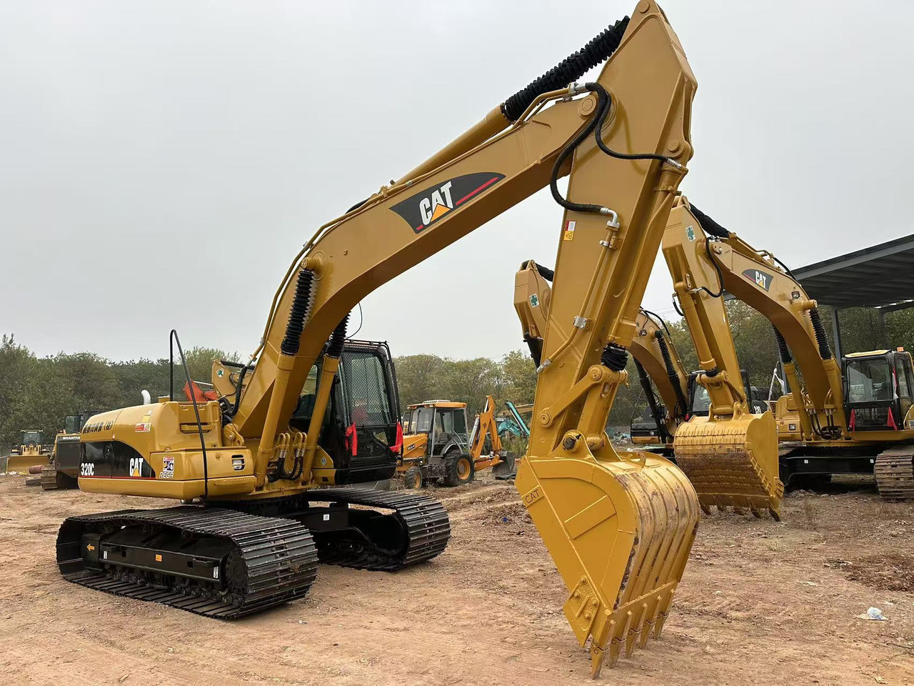 CATERPILLAR 320CL - Ekskavator perayap: gambar 2 CATERPILLAR 320CL - Ekskavator perayap: gambar 2