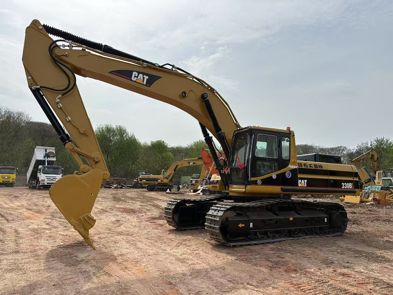 CATERPILLAR 330BL - Ekskavator: gambar 1 CATERPILLAR 330BL - Ekskavator: gambar 1