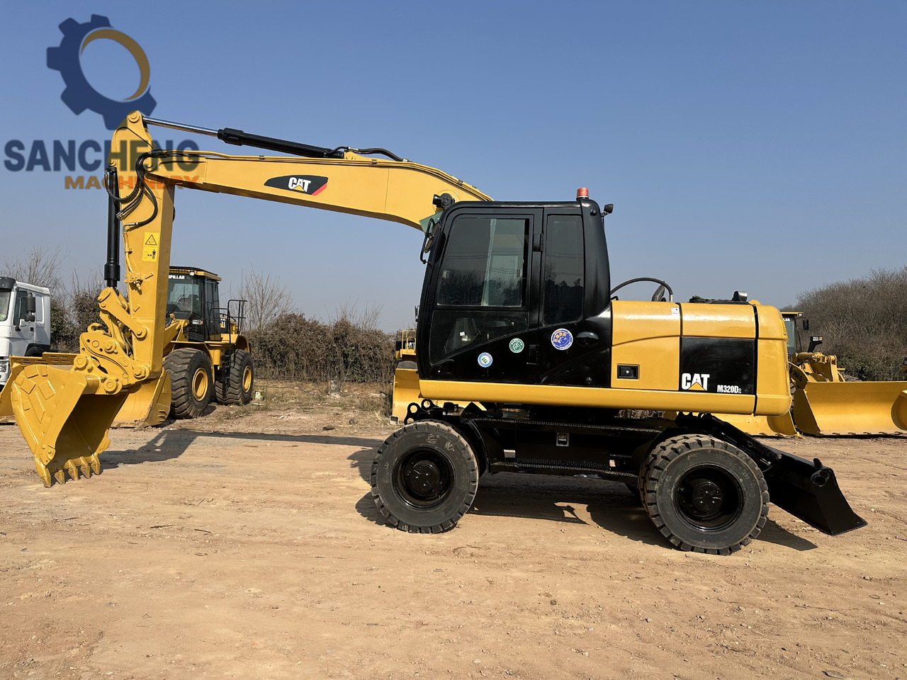 CATERPILLAR M320D2 - Ekskavator roda: gambar 2 CATERPILLAR M320D2 - Ekskavator roda: gambar 2