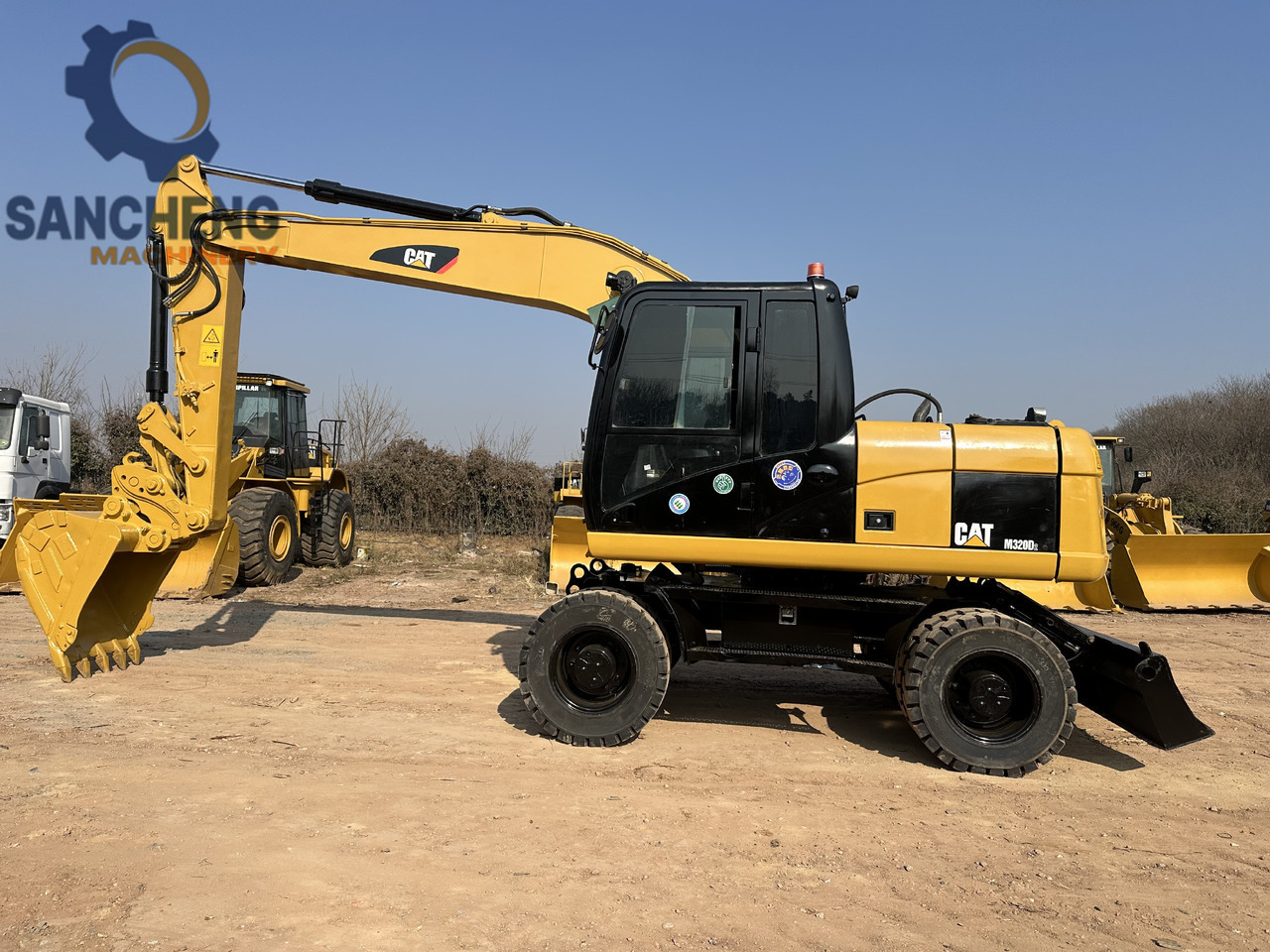 CATERPILLAR M320D2 - Ekskavator roda: gambar 4 CATERPILLAR M320D2 - Ekskavator roda: gambar 4