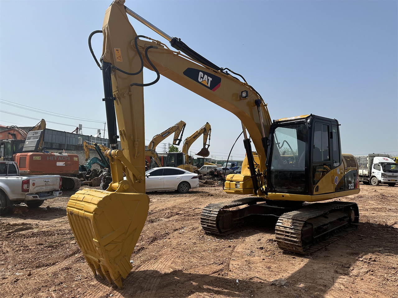 Caterpillar 312D - Ekskavator mini: gambar 3 Caterpillar 312D - Ekskavator mini: gambar 3