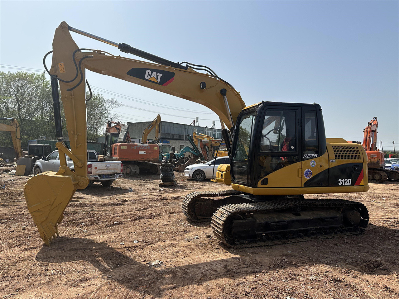 Caterpillar 312D - Ekskavator mini: gambar 4 Caterpillar 312D - Ekskavator mini: gambar 4