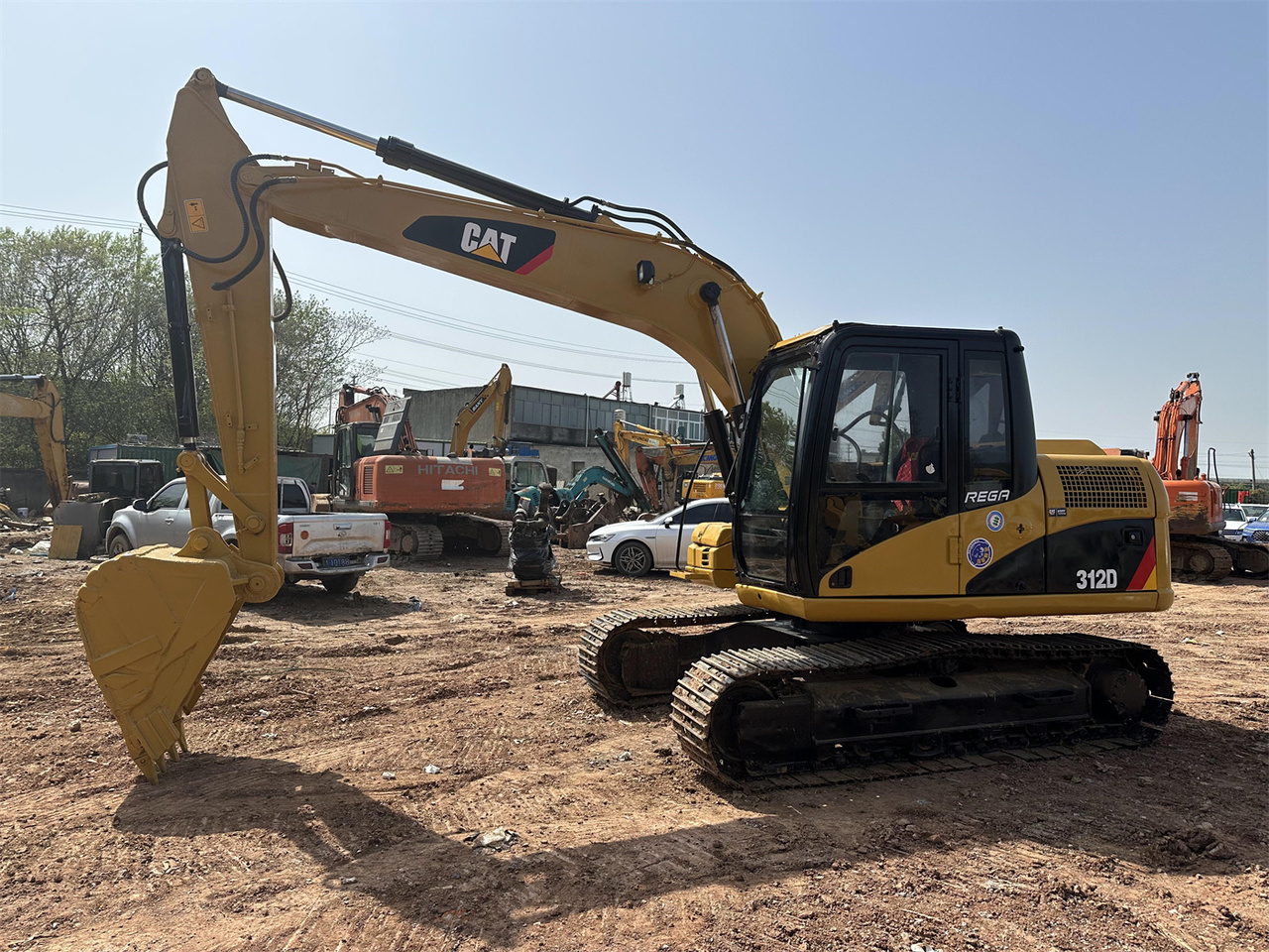 Caterpillar 312D - Ekskavator mini: gambar 4 Caterpillar 312D - Ekskavator mini: gambar 4