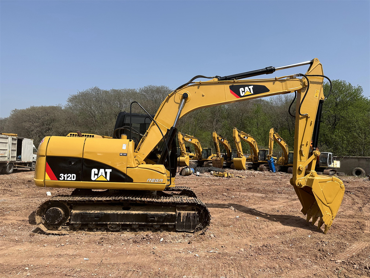Caterpillar 312D - Ekskavator mini: gambar 1 Caterpillar 312D - Ekskavator mini: gambar 1