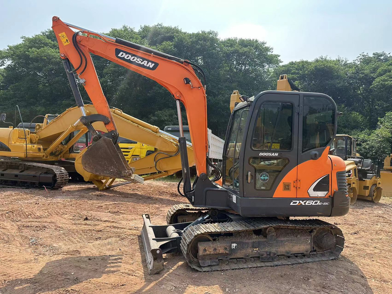 DOOSAN DX60 - Ekskavator mini: gambar 1 DOOSAN DX60 - Ekskavator mini: gambar 1