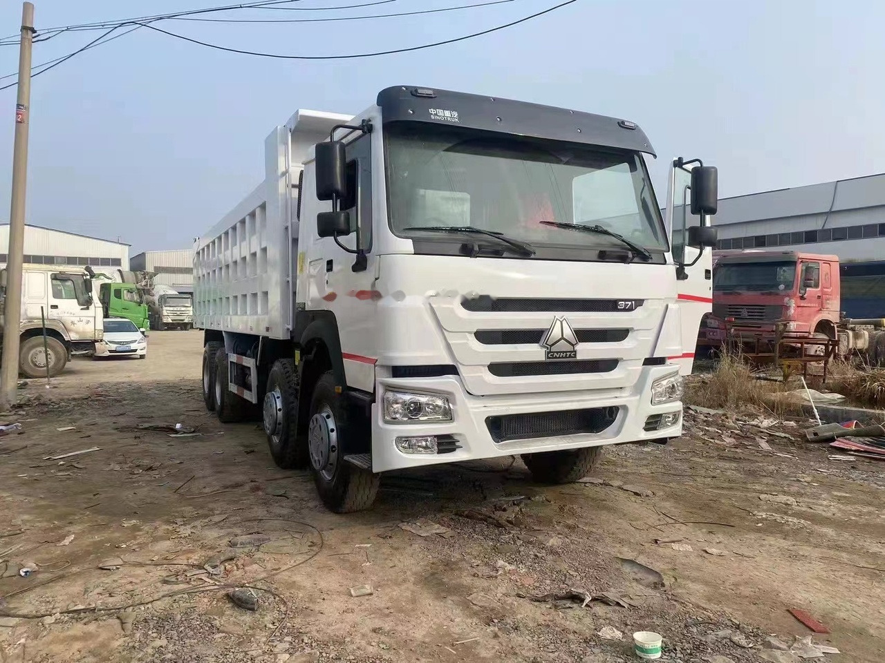 SINOTRUK HOWO 371 Tipper truck - Truk jungkit: gambar 4 SINOTRUK HOWO 371 Tipper truck - Truk jungkit: gambar 4