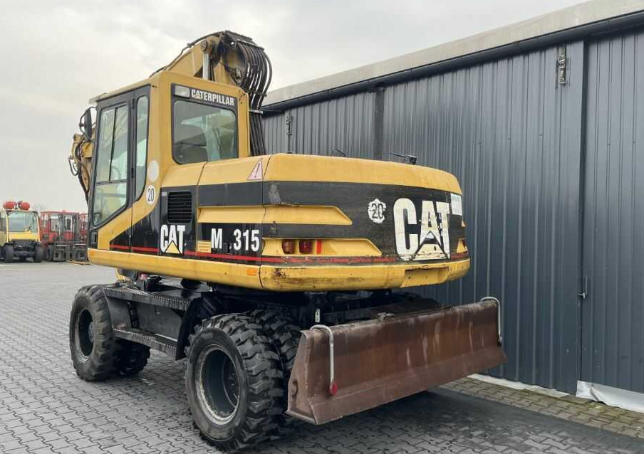 CAT Lift Trucks M315 - Ekskavator roda: gambar 3 CAT Lift Trucks M315 - Ekskavator roda: gambar 3
