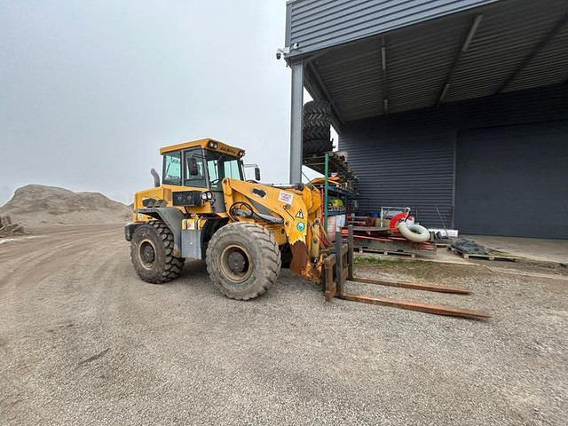 Ahlmann AS210 / AZ210 - - Loader konstruksi: gambar 4 Ahlmann AS210 / AZ210 - - Loader konstruksi: gambar 4