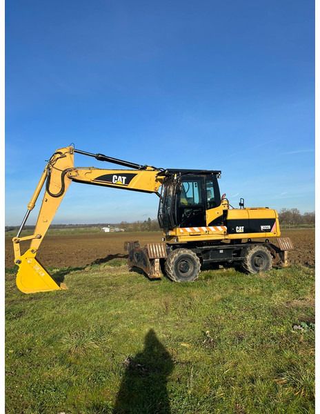 Caterpillar M322D VAH - Ekskavator roda: gambar 2 Caterpillar M322D VAH - Ekskavator roda: gambar 2