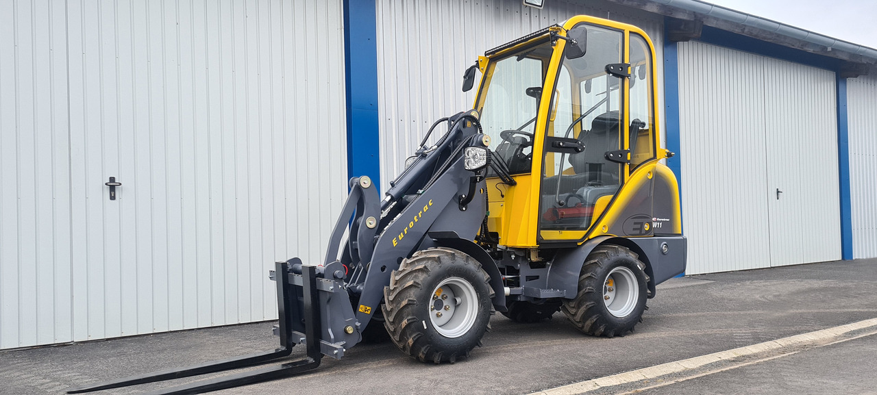 Eurotrac W11 Radlader Hoflader - Pemuat ringkas: gambar 1 Eurotrac W11 Radlader Hoflader - Pemuat ringkas: gambar 1