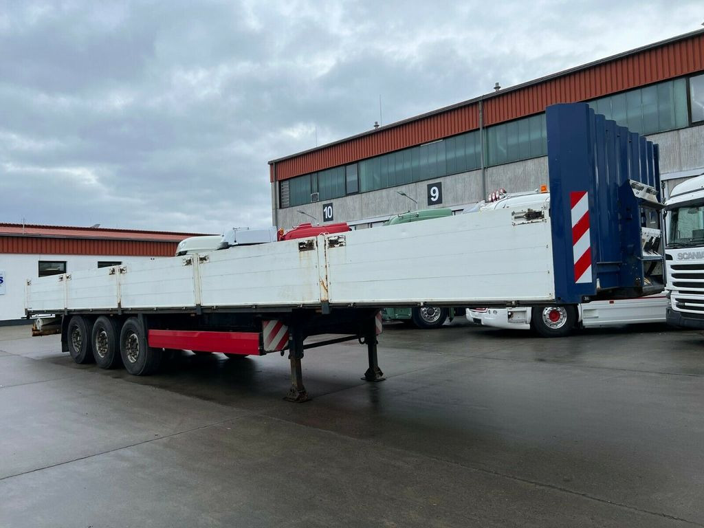 Krone SD * 3 ACHS * PRITSCHE * LIFTACHSE * BORDWÄNDE - Semi-trailer flatbed: gambar 4 Krone SD * 3 ACHS * PRITSCHE * LIFTACHSE * BORDWÄNDE - Semi-trailer flatbed: gambar 4