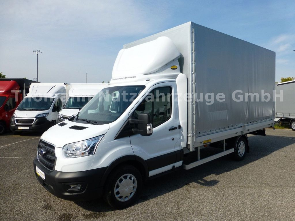 Ford Transit Pritsche Plane 4,25m Klima Temp. DAB Ford Transit Pritsche Plane 4,25m Klima Temp. DAB - Van dengan terpal samping: gambar 2 Ford Transit Pritsche Plane 4,25m Klima Temp. DAB Ford Transit Pritsche Plane 4,25m Klima Temp. DAB - Van dengan terpal samping: gambar 2