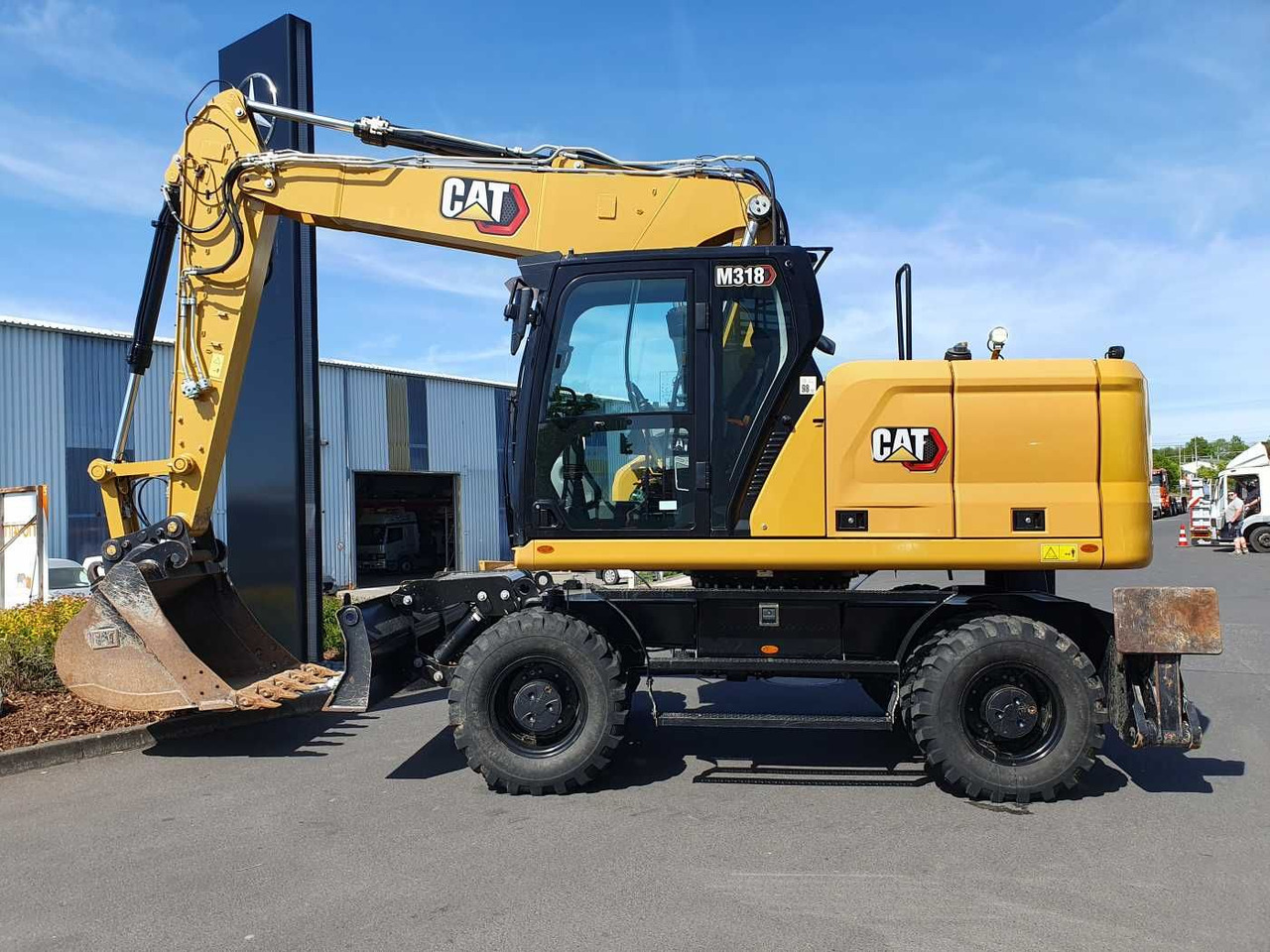 CAT M318 / 2022 / nur 286h! / Tieflöffel / Pratzen - Ekskavator roda: gambar 2 CAT M318 / 2022 / nur 286h! / Tieflöffel / Pratzen - Ekskavator roda: gambar 2