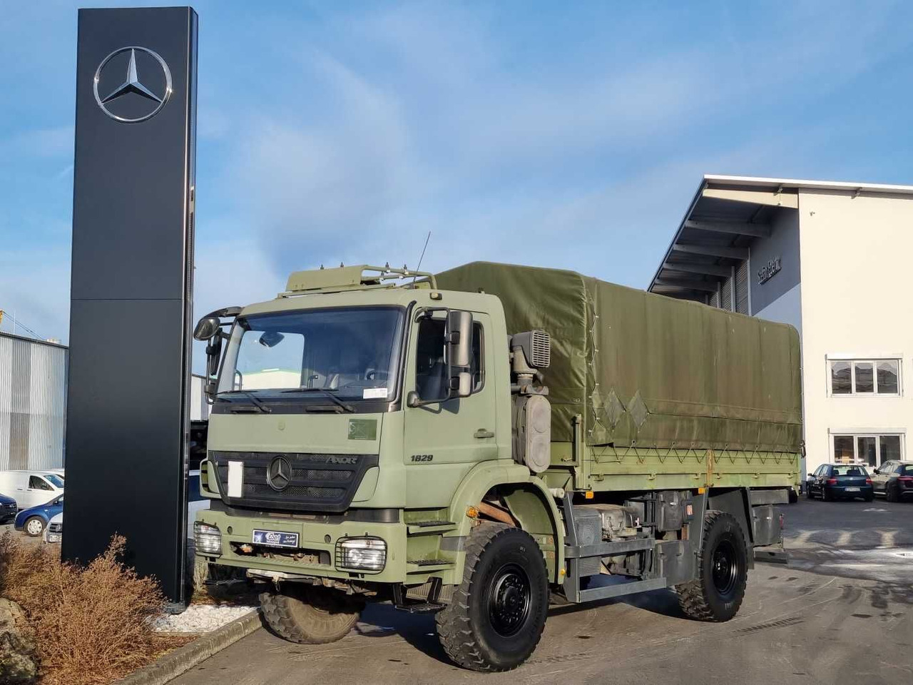 Mercedes-Benz Axor 1829 A 4x4 Pritsche/Plane 10 Stück - Truk dengan terpal samping: gambar 1 Mercedes-Benz Axor 1829 A 4x4 Pritsche/Plane 10 Stück - Truk dengan terpal samping: gambar 1