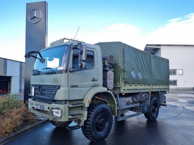 Mercedes-Benz Axor 1829 A 4x4 Pritsche/Plane 10 Stück - Truk dengan terpal samping: gambar 1 Mercedes-Benz Axor 1829 A 4x4 Pritsche/Plane 10 Stück - Truk dengan terpal samping: gambar 1