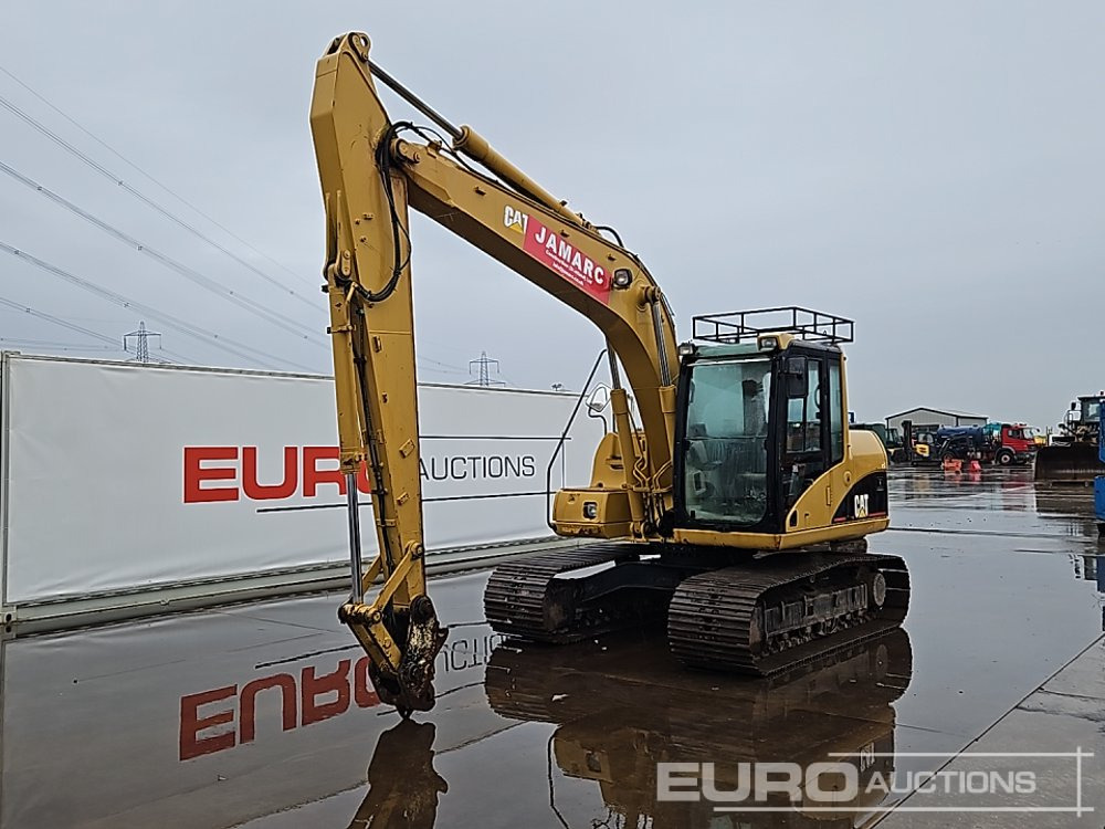 CAT 312C - Ekskavator perayap: gambar 1 CAT 312C - Ekskavator perayap: gambar 1